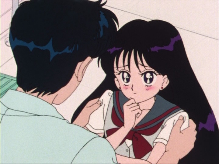 Rei blushes while looking at Mamoru