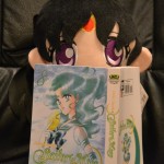 Sailor Mars reading Sailor Moon manga vol. 8 - Sailor Neptune cover