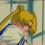 Usagi crying in a phone booth