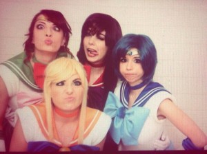 Katie George as Sailor Jupiter, Monika Lee as Sailor Mars, Jessica Nigri as Sailor Venus and Riddle as Sailor Venus making faces