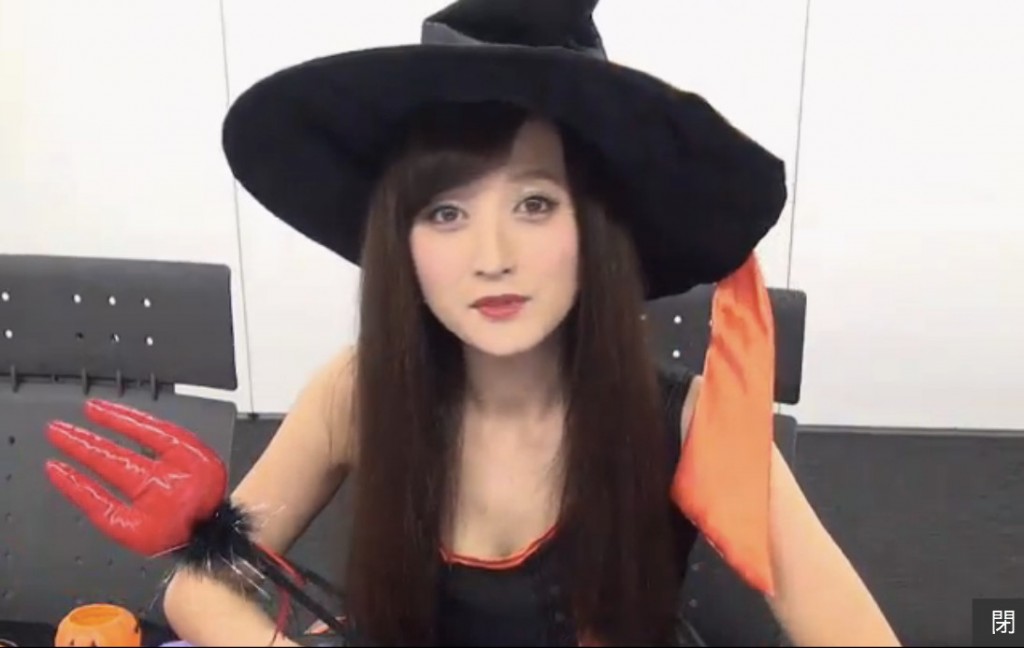 Ayaka Komatsu dressed as a witch for her Halloween special