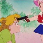 Sailor Moon R episode 60 - Chibiusa pointing a gun at Usagi