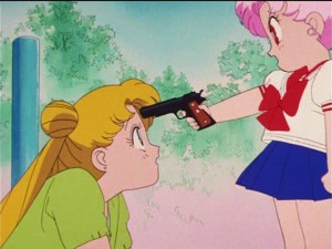 Sailor  Moon R episode 60 - Chibiusa pointing a gun at Usagi