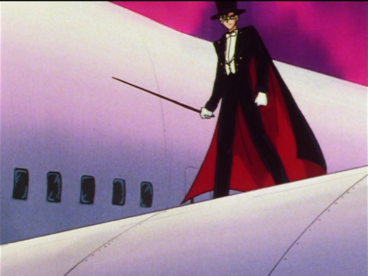 Sailor Moon Sailor Stars episode 197 - Tuxedo Mask chilling on a wing