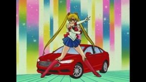 Sailor Moon in front of a Ford Fusion