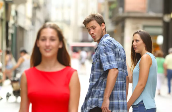 Distracted Boyfriend or Man Looking at Other Woman meme