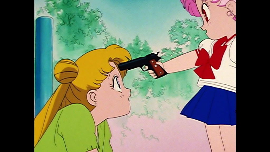 Sailor Moon R episode 60 - Viz Blu-Ray - Chibiusa points a gun at Usagi