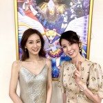Keiko Kitagawa and Kotono Mitsuishi with a Sailor Moon Cosmos Poster